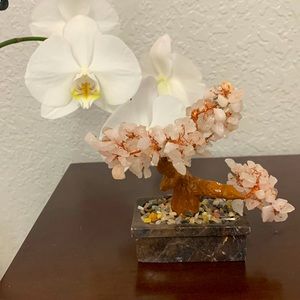 Cherry blossom pink gemstone tree decor with stone base .